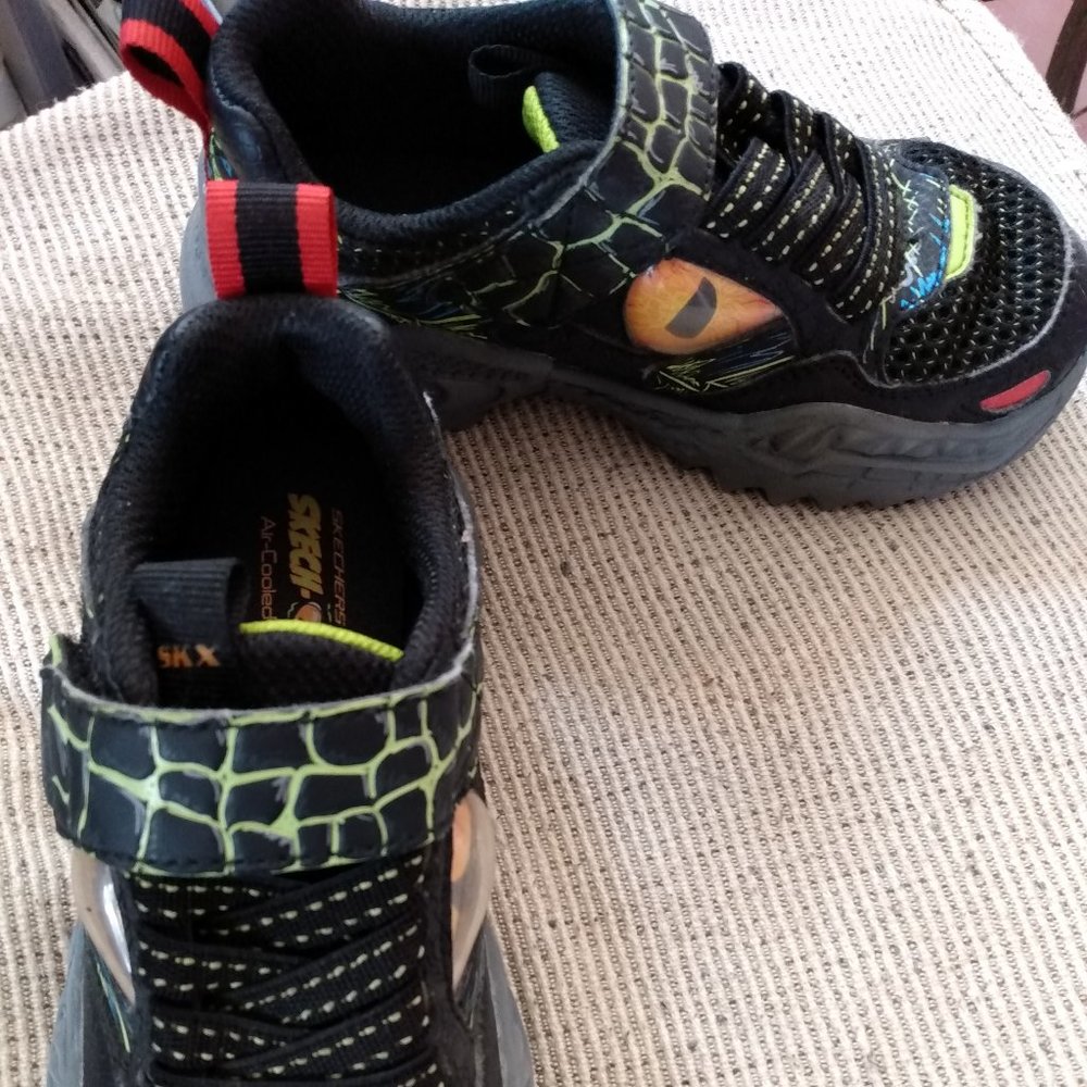Boys Skechers Dinosaur sneakers size 12 pre-owned